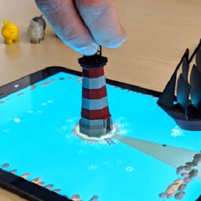 Itsy-Bits: Fabrication and Recognition of 3D-Printed Tangibles with Small Footprints on Capacitive Touchscreens